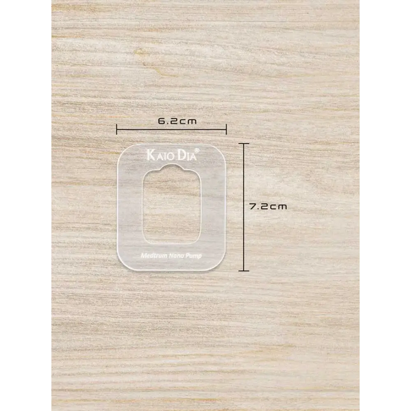 Insulin patch pump template by Kaio-Patch on wooden background, showing dimensions of 6.2cm by 7.2cm.