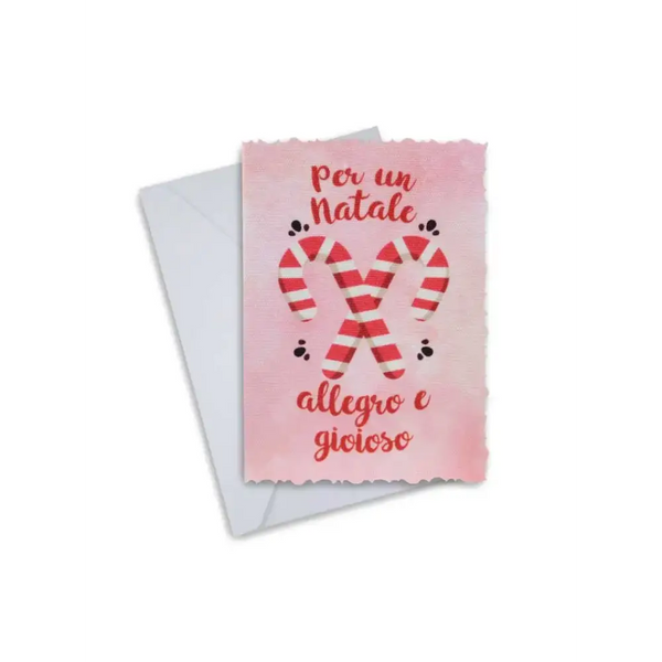 Elegant Christmas greeting card with candy cane design, featuring message in Italian, accompanied by white envelope.