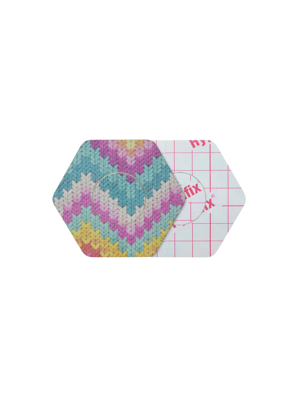 FreeStyle Libre 2 hexagonal shape patch front and back view, showing printed fabric and adhesive side for sensor support