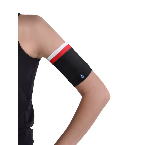 Black glucose monitor and insulin pump armband with red and white stripes worn on upper arm