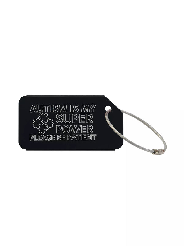 Black medical luggage tag with the text 'Autism Is My Super Power Please Be Patient' engraved.