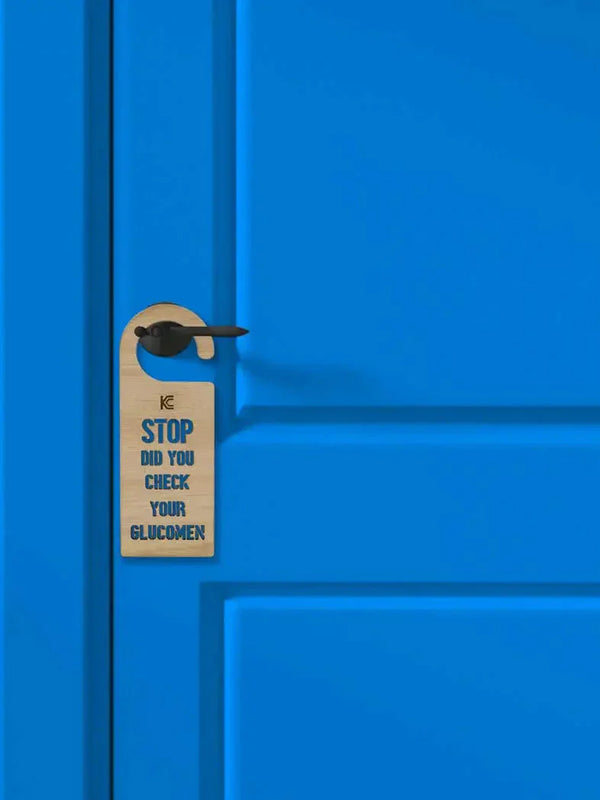 Door hanger for diabetics reminding to check blood glucose levels.