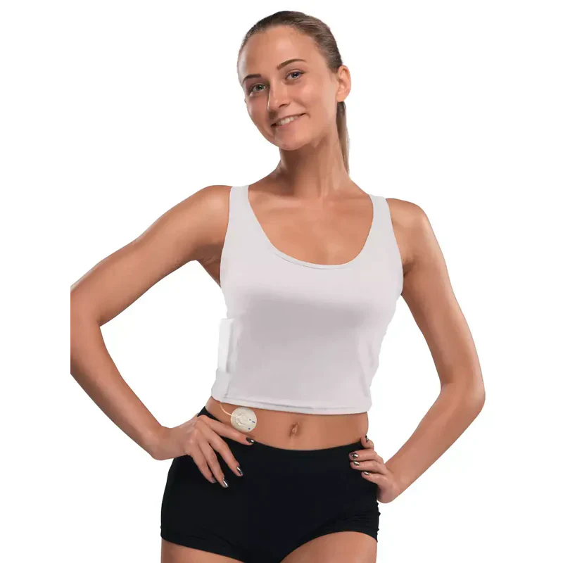 woman wearing white insulin pump crop top with integrated pocket for discreet and comfortable insulin pump support Bild