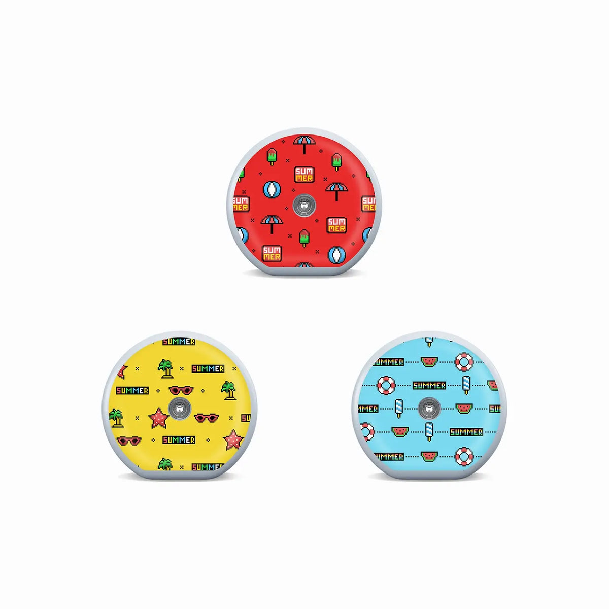 Three Accu-Chek SmartGuide sensor stickers in red, yellow and blue pixel-art designs with playful summer icons. Bild