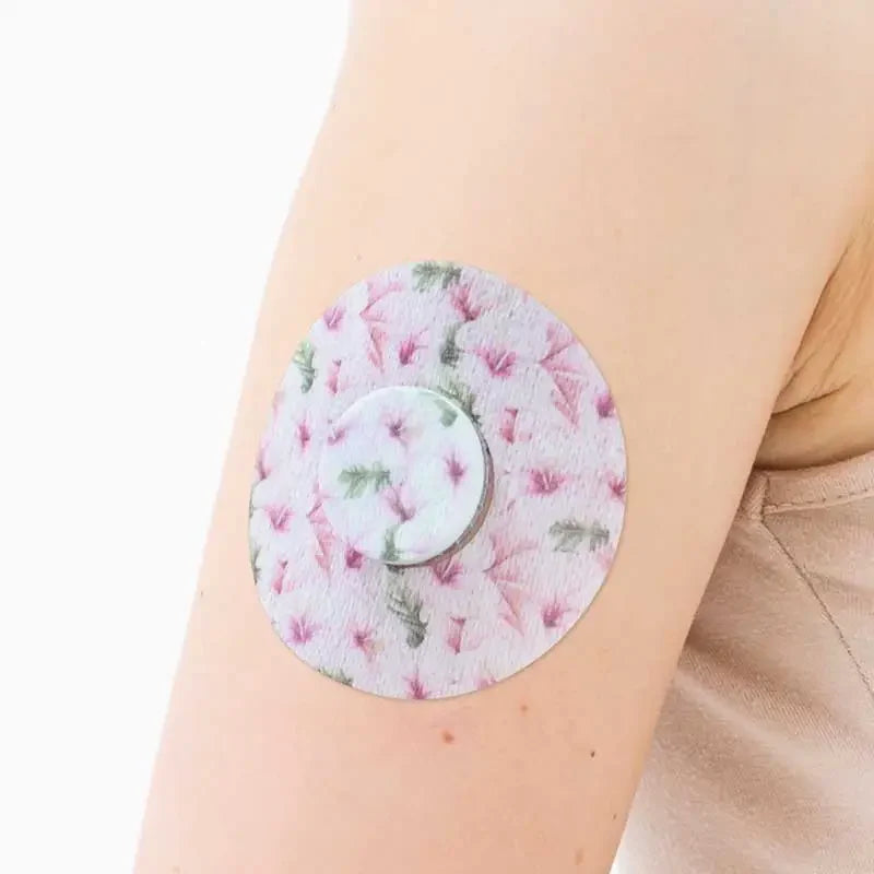 freestyle libre sensor patch on the arm Bild