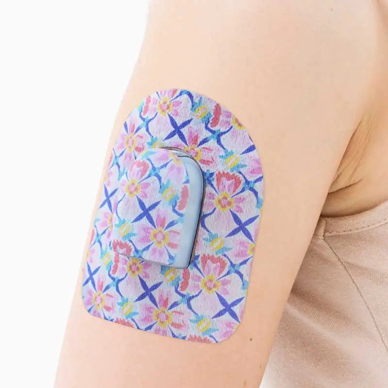 omnipod pod colorful patch on the arm Bild