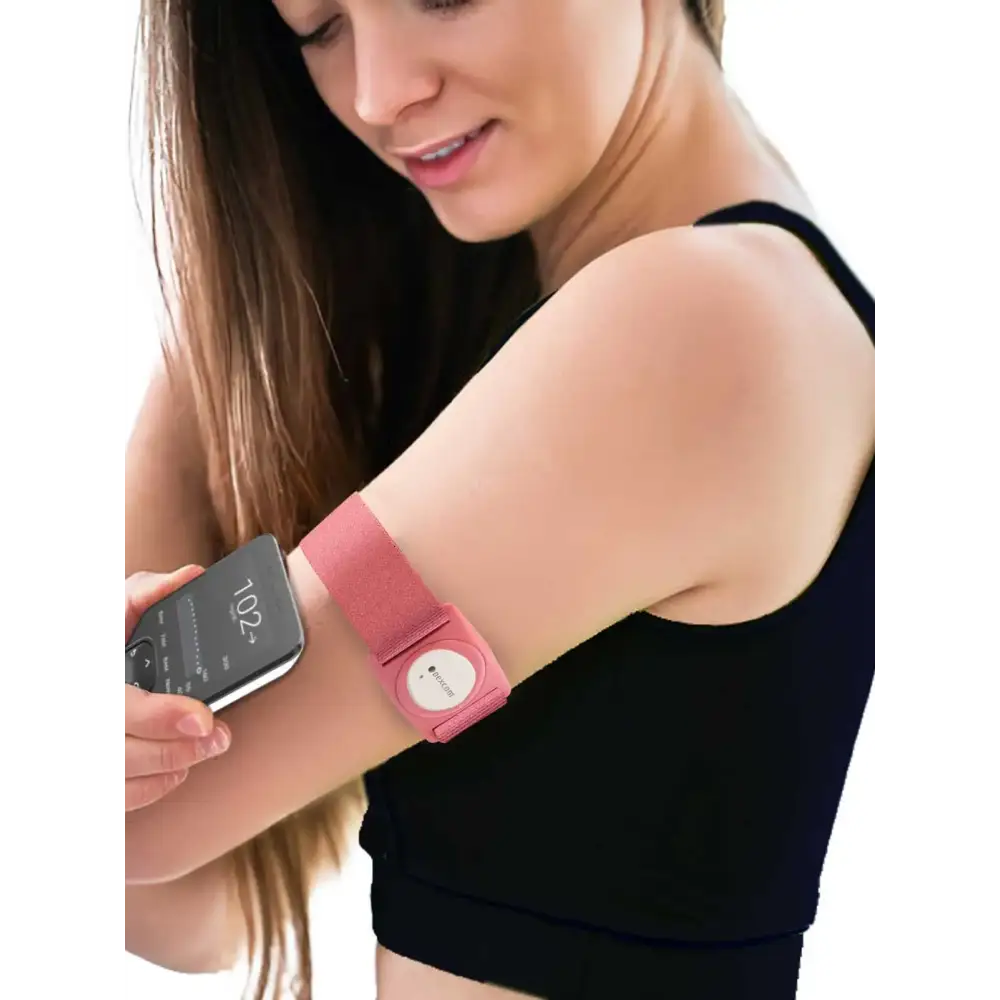 Adjustable pink armband with rotating clip for Dexcom G7 sensor, Barbie Edition.