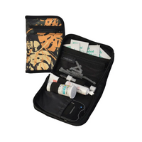 Compact diabetic travel case with compartments for glucometer, strips, and accessories.