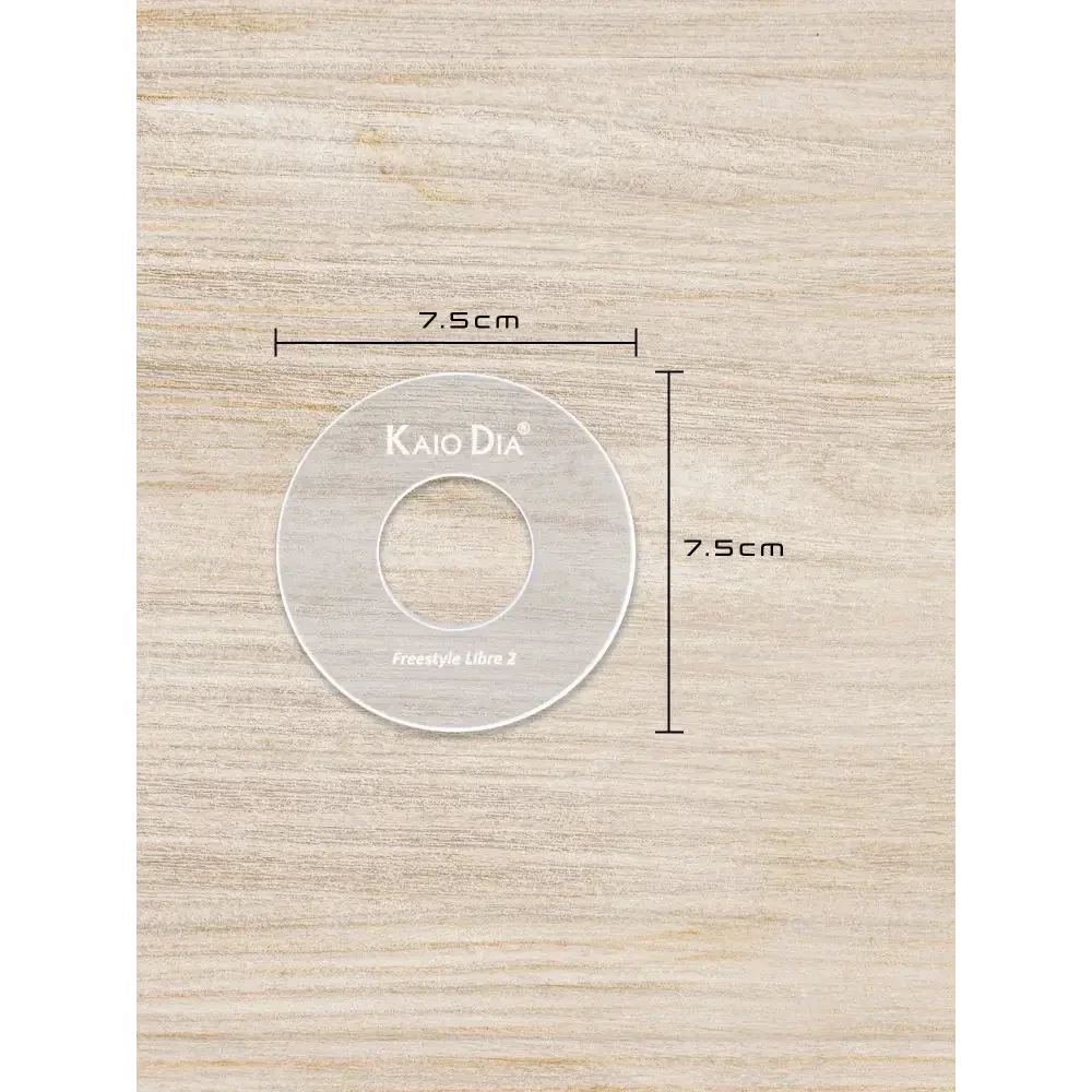 CGM Sensor Patch Template on wooden background showing 7.5cm dimensions.