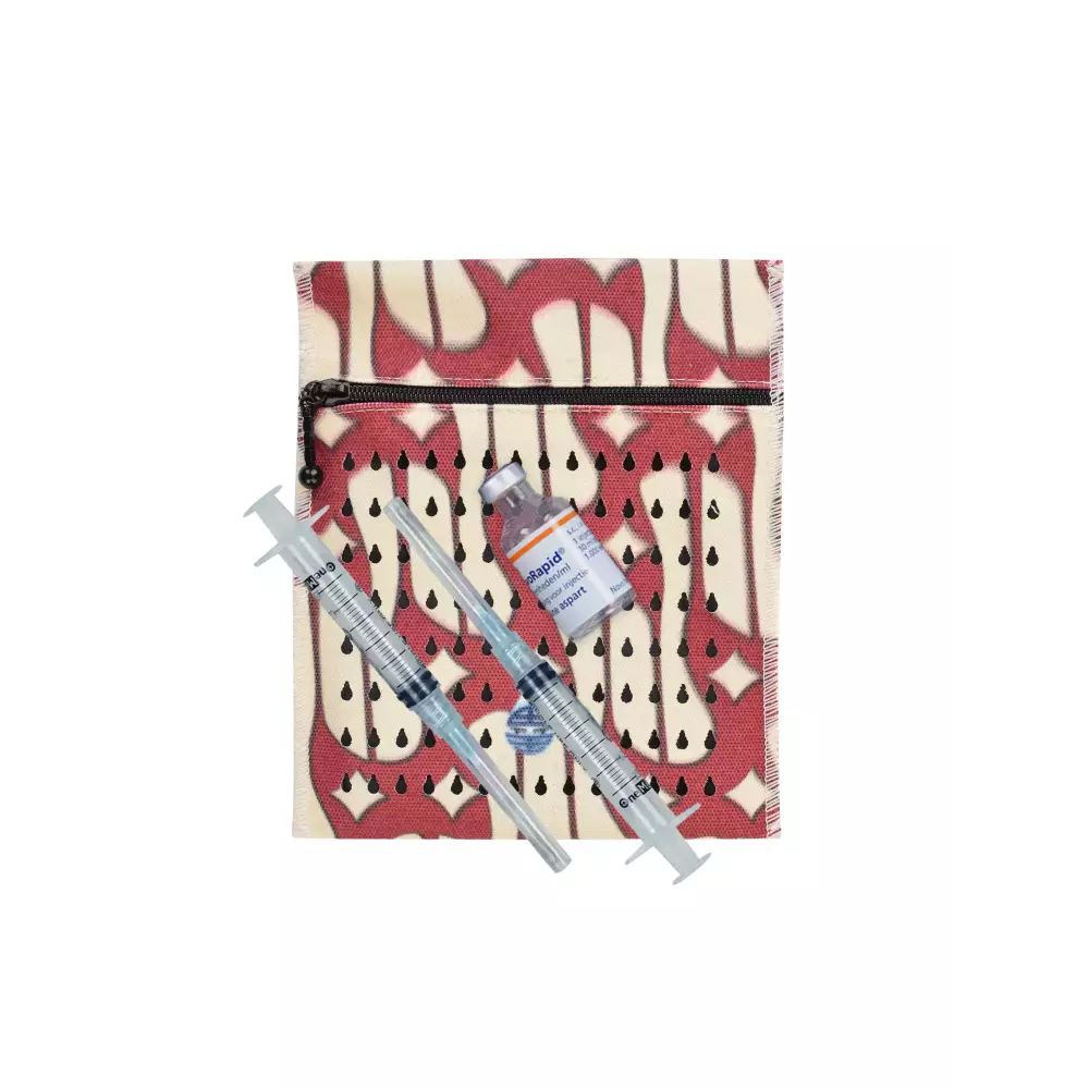 Insulin cooling wallet for vials with red pattern design, compact and travel-friendly.