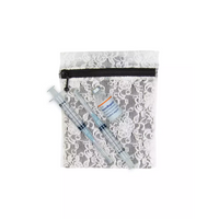 Insulin cooling wallet in lace design, holding insulin vials and syringes.