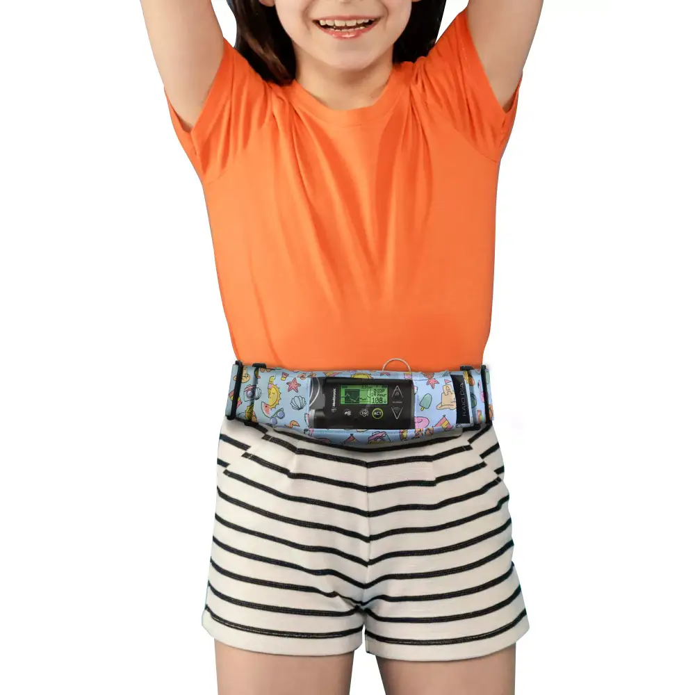 Child wearing Dia-Waist Insulin Pump Belt with fun design and touch-friendly window.