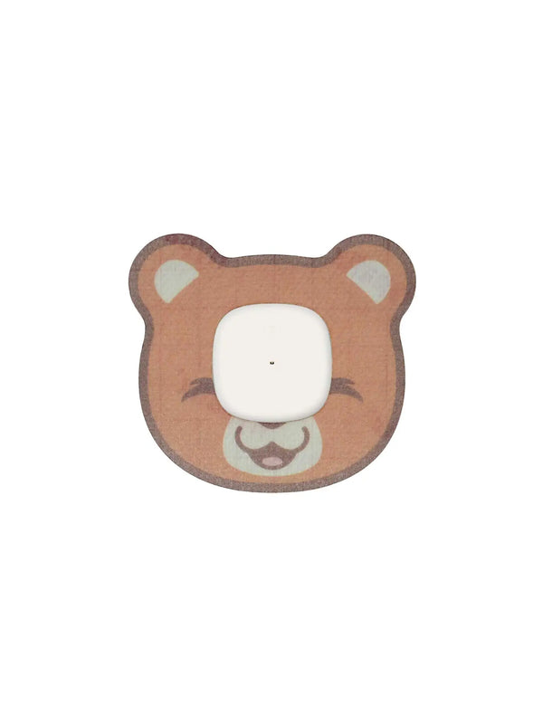 Simplera Sync CGM kids bear patch front view adhesive overpatch designed for comfort and secure sensor hold