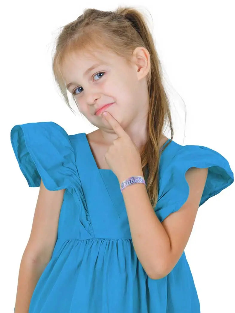 Child wearing a reversible Type 1 diabetes awareness wristband with vibrant summer patterns.