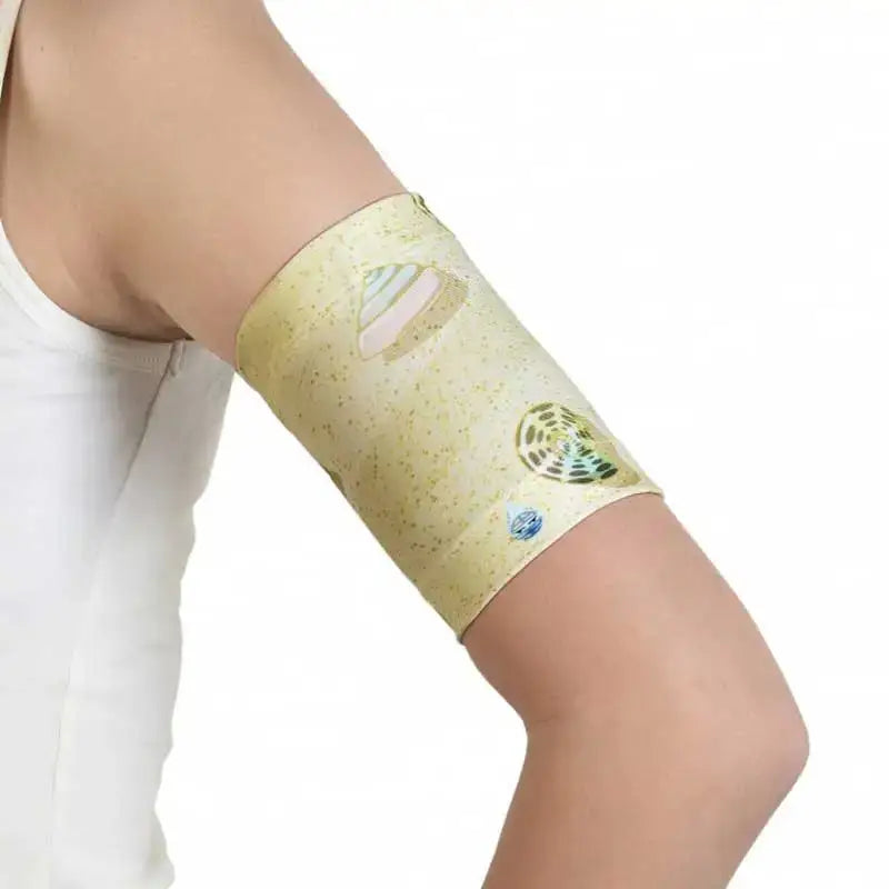Glucose sensor armband for kids with sea-themed design, securely holds devices for active children.