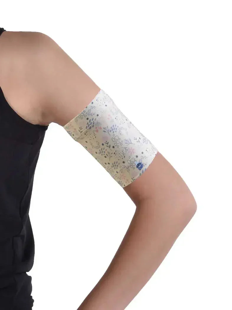 Elastic armband for blood glucose monitor, protecting glucose sensors and pods, stylish design.
