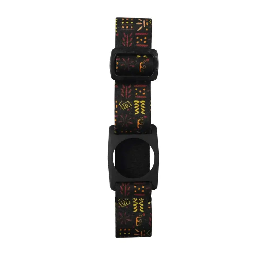 The Freestyle Libre 2 Armband with a colorful geometric pattern on a black background, showcasing the adjustable strap and sensor holder.