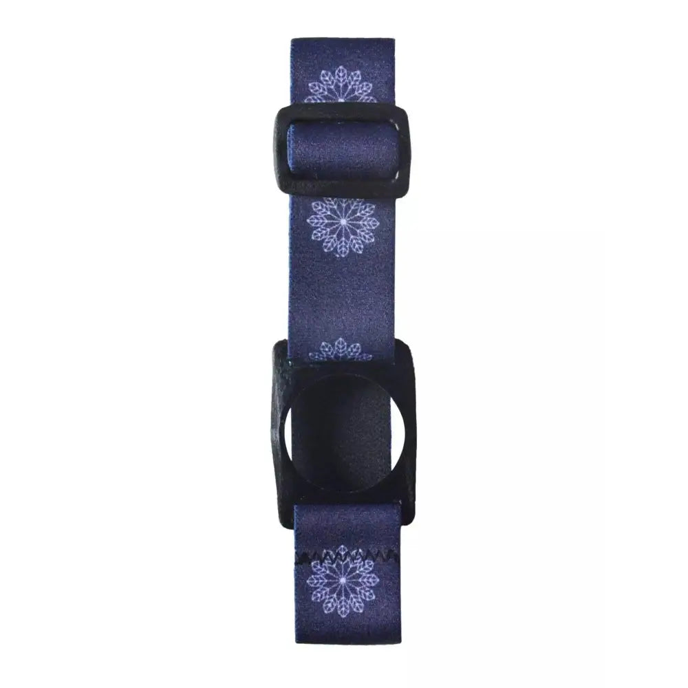  The Freestyle Libre 2 Armband with a floral white pattern on a dark navy background, showcasing the adjustable strap and sensor holder.