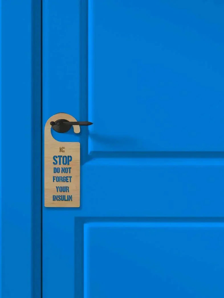DO NOT FORGET YOUR INSULIN door hanger on blue door.